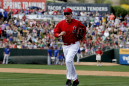 Actor Will Ferrell plays for Los Angeles Angels during a spring training baseball exhibition game against the Chicago Cubs in Tempe, Ariz., on Thursday, March 12, 2015. The comedian plans to play every position while making appearances at five Arizona spring training games on Thursday. (AP Photo/Chris Carlson)