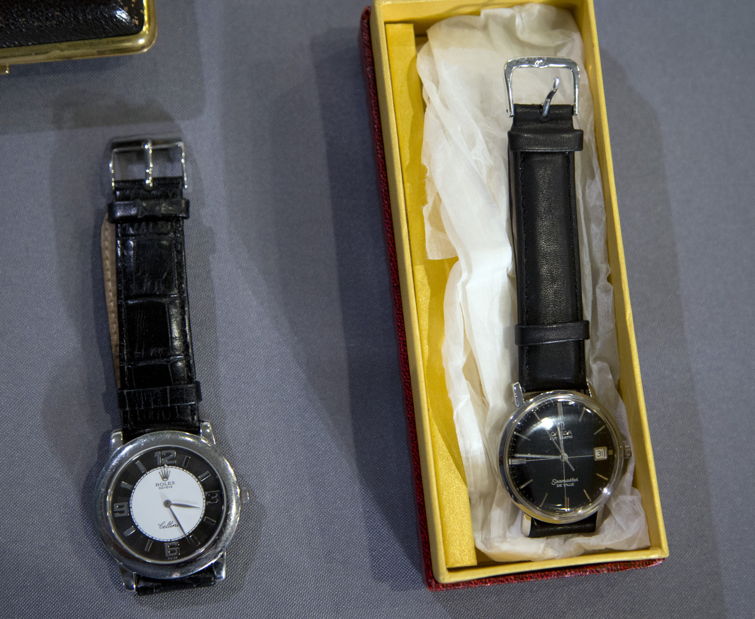 Two watches included with some objects, costumes, props, sketches and a script AMC and Lionsgate TV series, "Mad Men" donated to the National Museum of American History in Washington, is displayed during a ceremony, Friday, March 27, 2015.   (AP Photo/Manuel Balce Ceneta)