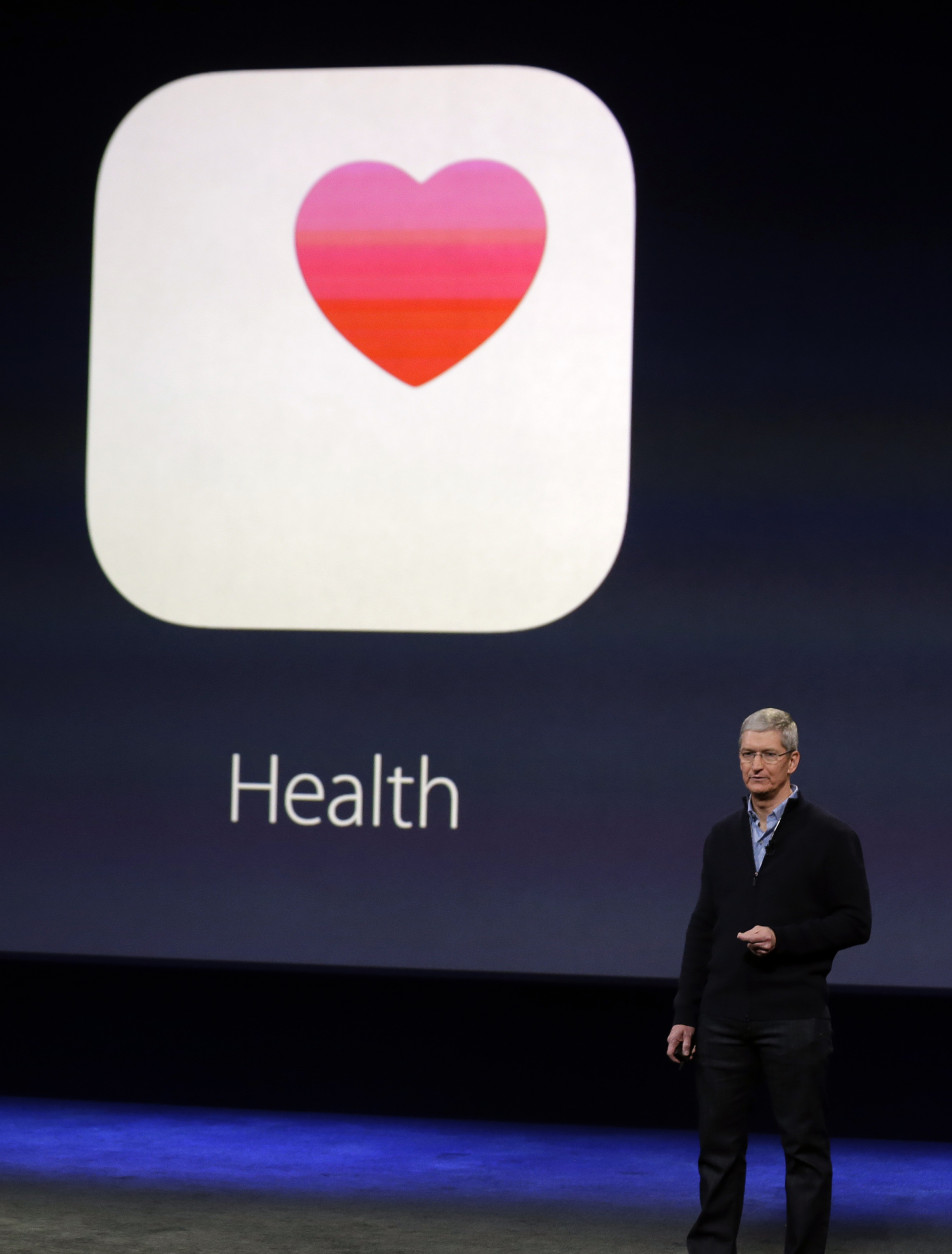 Apple CEO Tim Cook talks about Health apps during an Apple event on Monday, March 9, 2015, in San Francisco. (AP Photo/Eric Risberg)