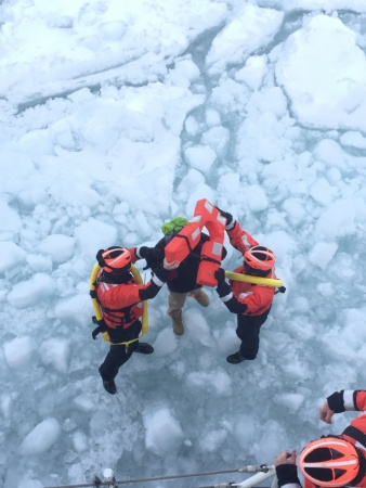 Coast Guard Cutter Neah Bay's crew rescued the man from the frozen lake on March 5, 2015. (U.S. Coast Guard photo by Lt. Josh Zike)