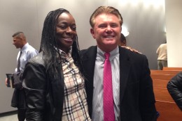 Shuletta Moore, a recovering drug addict who graduated from the Montgomery County Drug Court in 2010. She was the guest speaker at the November 2014 graduating class on the 10th anniversary of Drug Court. She is pictured here with  Maryland State’s Attorney John McCarthy. (WTOP/Jamie Forzato)