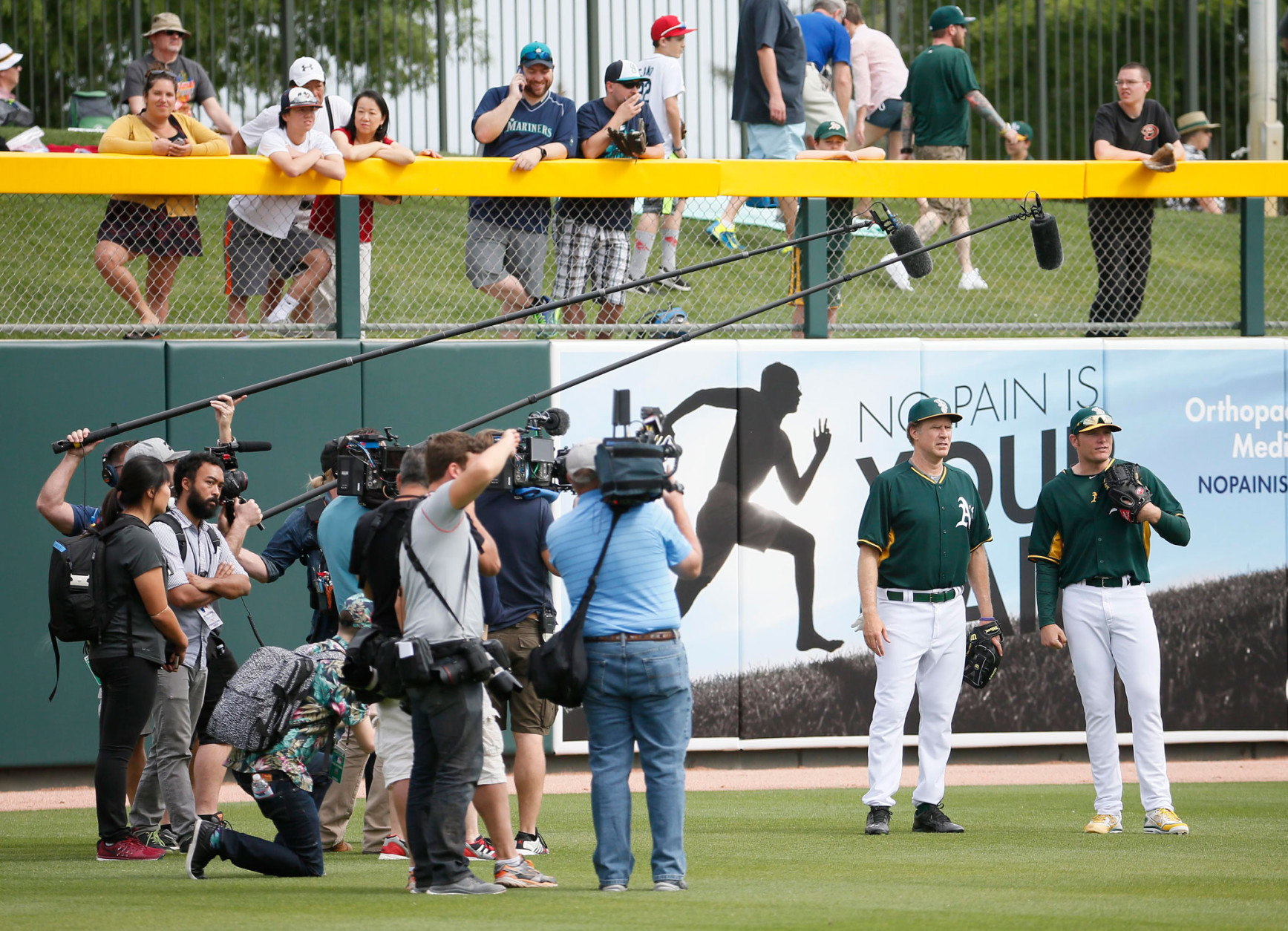 Before taking the field with the Athletics at second base, Farrell warmed up in the outfield, where he received plenty of attention. He wouldn't see any action in the field, nor would he bat for the A's. (AP Photo/Matt York)