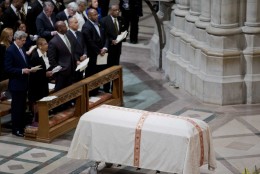 The coffin containing the remains of the late Massachusetts Sen. Edward William Brooke III, rests inside the Washington National Cathedral, in Washington, Tuesday, March 10, 2015, during a funeral services. Brooke, the first African-American to be popularly elected to the United States Senate. Brooke died on Jan. 3, 2015 at his home in Coral Gables, Fla. He was 95. Front row, from left are, Secretary of State John Kerry, Del. Eleanor Holmes Norton, D-D.C., Sen. Tim Scott, R-S.C., and former Massachusetts Gov. Deval Patrick.    (AP Photo/Manuel Balce Ceneta)