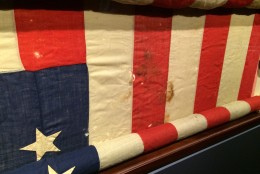 The blood-stained flag in the Presidential Box at Ford's Theatre is seen here. (WTOP/Nick Iannelli)