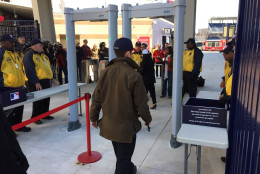 A man walks through a newly installed metal detector at Nationals Park Monday, March 23. Fans will be screened by the detectors beginning with the For the first exhibition game on April 4.  (WTOP/Andrew Mollenbeck)