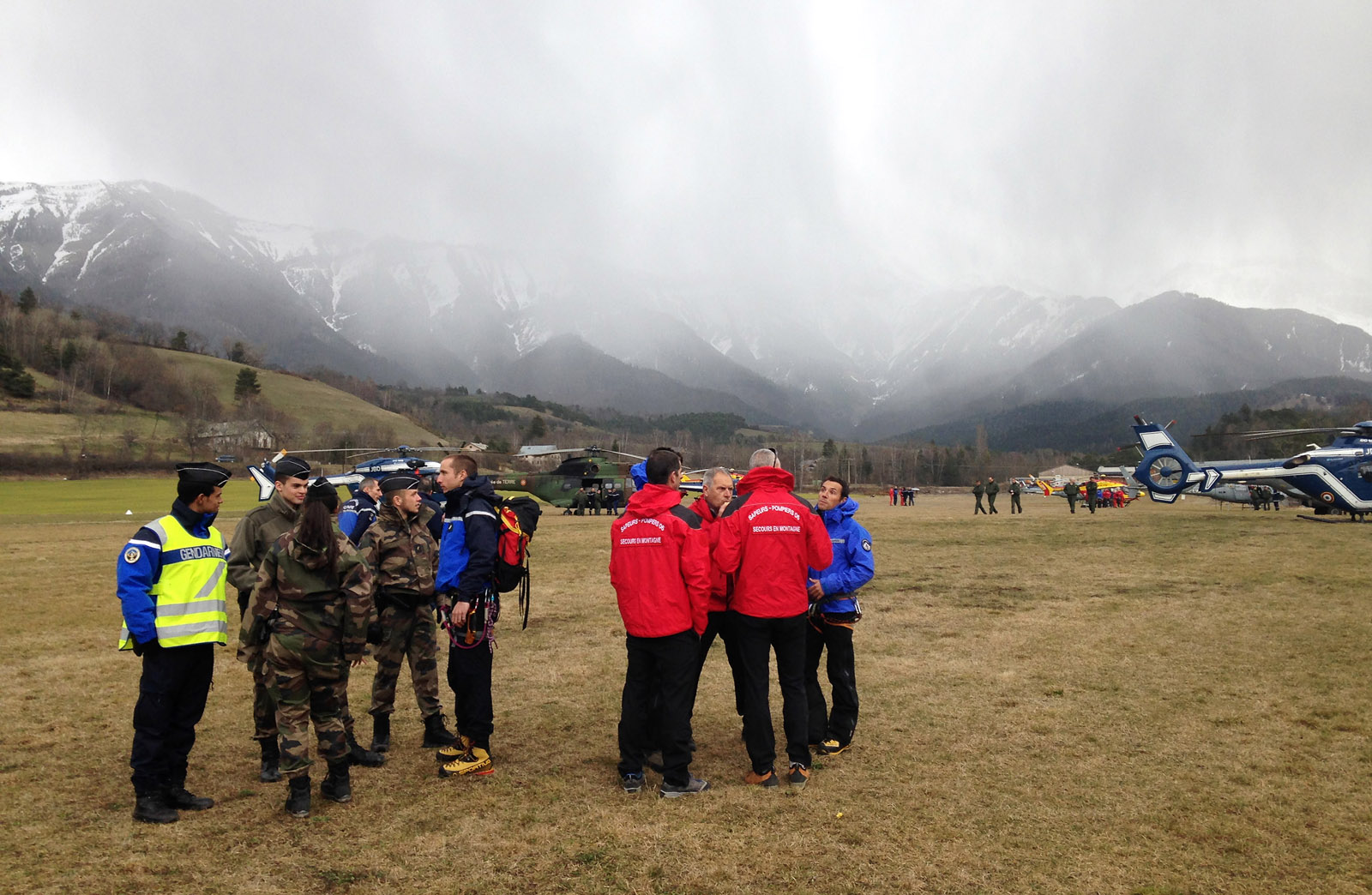 DIGNE, FRANCE- MARCH 24:  French mountain rescue teams and gendarmerie arrive near the site of the Germanwings plane crash in the French Alps on March 24, 2015 in Digne, France.  A Germanwings Airbus A320 airliner with 148 people on board has crashed in the French Alps. (Photo by Patrick Aventurier/Getty Images)