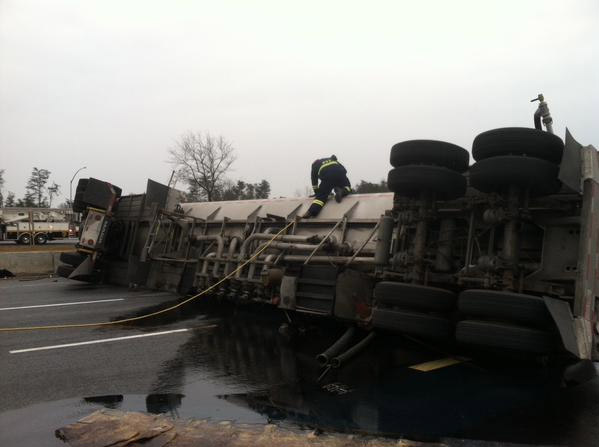 Crews respond to a tanker truck that overturned on Interstate 95 in Laurel Tuesday. (Prince George's County Hazmat/Craig Black)