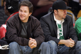 Actor Mark Wahlberg, left, sits with his brother Donnie as they watch the Boston Celtics play the Los Angeles Lakers in their NBA basketball game, Sunday, Dec. 30, 2007, in Los Angeles. (AP Photo/Mark J. Terrill)