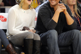 Actress Kate Hudson watches the Los Angeles Lakers NBA basketball game against the Los Angeles Clippers with her brother and actor Oliver Hudson, Wednesday, Nov. 5, 2008 in Los Angeles.  (AP Photo/Mark J. Terrill)