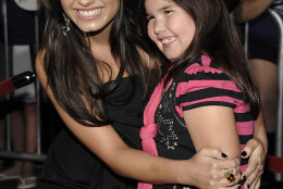 Singer Demi Lovato, left, and her sister, actress Madison De La Garza pose on the press line at the premiere of "Jonas Brothers: The 3D Concert Experience" in Hollywood, Calif. on Tuesday, Feb. 24, 2009. (AP Photo/Dan Steinberg)