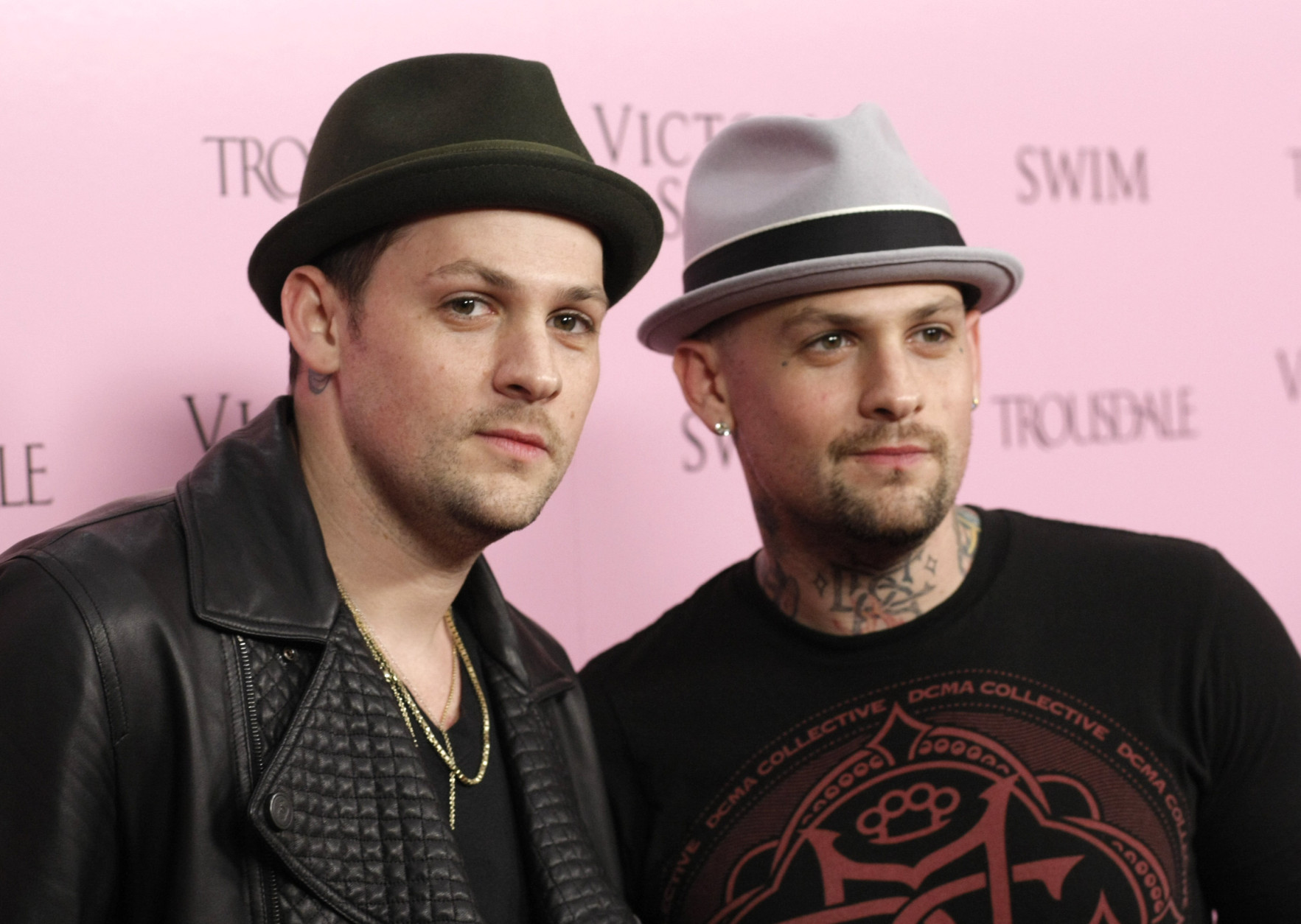 Musician Joel Madden, left, and his brother Benji Madden arrive at the Victoria's Secret SWIM catalog 15th anniversary party in West Hollywood, Calif. on Thursday, March 25, 2010. (AP Photo/Dan Steinberg)