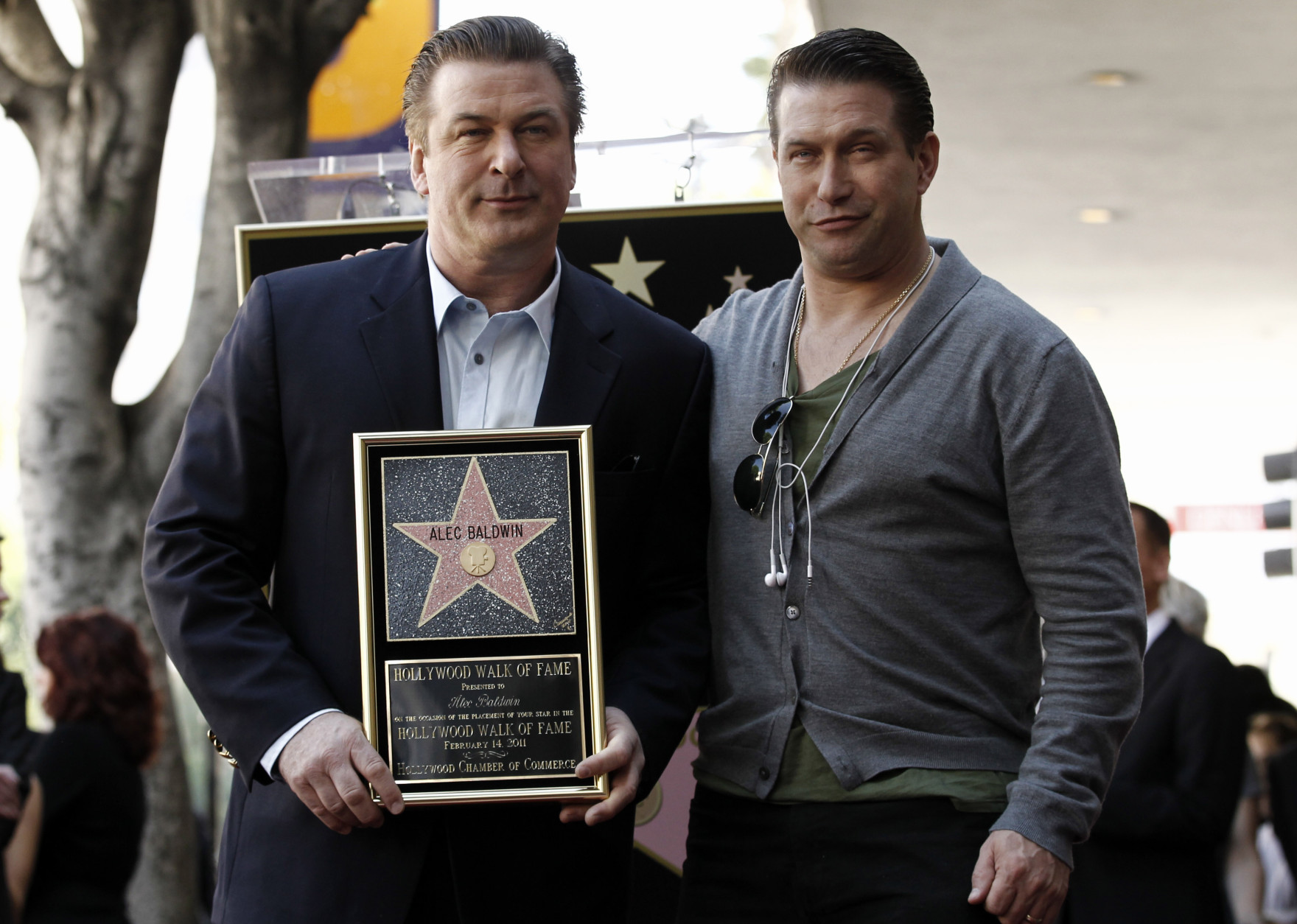 Alec Baldwin, left, and Stephen Baldwin pose together after Alec Baldwin received a star on the Hollywood Walk of Fame in Los Angeles on Monday, Feb. 14, 2011. (AP Photo/Matt Sayles)