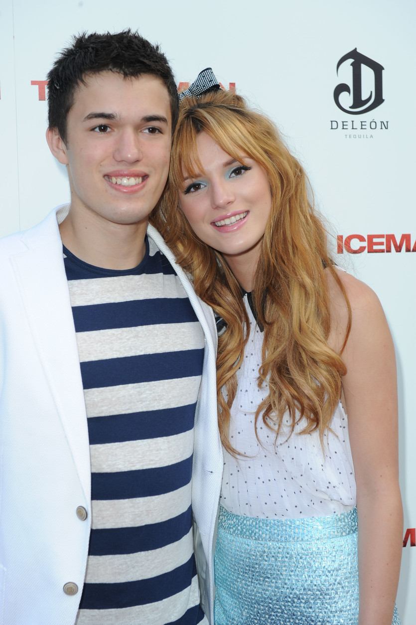 Brendan Throne, at left, and his siter, Bella Thorne arrives at the LA Special Screening of "The Iceman" at the ArcLight Hollywood Theater on Monday, April 22, 2013 in Hollywood, Calif. (Photo by Katy Winn/Invision/AP)