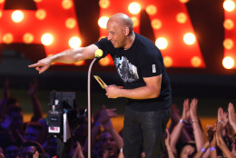 Vin Diesel presents the award for best female performance at the MTV Movie Awards at the Nokia Theatre on Sunday, April 12, 2015, in Los Angeles. (Photo by Matt Sayles/Invision/AP)