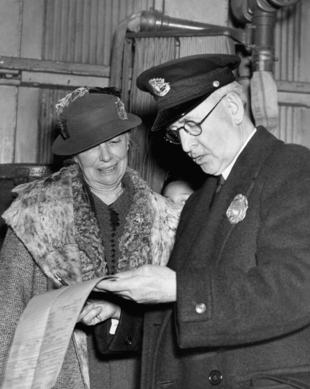 Mrs. Helen Taft, widow of the former President William Howard Taft, is checking with a customs officer as she arrived on April 5, 1936 in New York aboard the steamer vacation from Vera Cruz, Mexico, were she went for a winter holiday.   Mrs. Taft is returning to Washington D.C. to attend the cherry blossom festival which she established while in the White House (AP Photo)