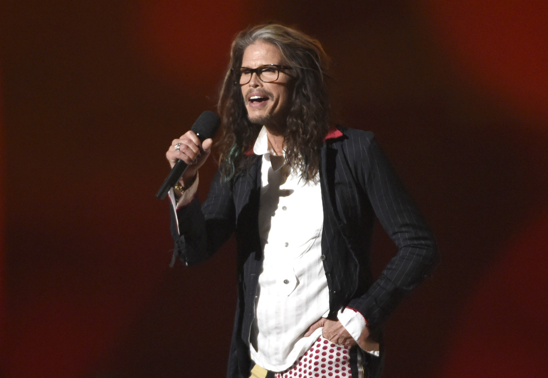 Steven Tyler speaks on stage at the 50th annual Academy of Country Music Awards at AT&amp;T Stadium on Sunday, April 19, 2015, in Arlington, Texas. (Photo by Chris Pizzello/Invision/AP)