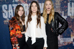 Haim, from left, Alana Haim, Danielle Haim and Este Haim attend the SNL 40th Anniversary Special at Rockefeller Plaza on Sunday, Feb. 15, 2015, in New York. (Photo by Evan Agostini/Invision/AP)