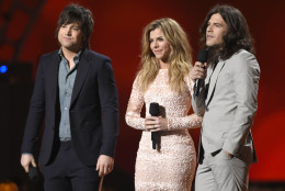 Neil Perry, from left, Kimberly Perry and Reid Perry, of The Band Perry, present the award for vocal duo of the year at the 50th annual Academy of Country Music Awards at AT&amp;T Stadium on Sunday, April 19, 2015, in Arlington, Texas. (Photo by Chris Pizzello/Invision/AP)