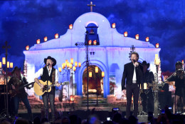 Kix Brooks, left, and Ronnie Dunn, of Brooks &amp; Dunn, perform at the 50th annual Academy of Country Music Awards at AT&amp;T Stadium on Sunday, April 19, 2015, in Arlington, Texas. (Photo by Chris Pizzello/Invision/AP)