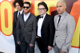 Joe Trohman, from left, Andy Hurley, Patrick Stump and Pete Wentz, of Fall Out Boy, arrive at the MTV Movie Awards at the Nokia Theatre on Sunday, April 12, 2015, in Los Angeles. (Photo by Matt Sayles/Invision/AP)