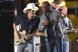 Brad Paisley, left, and Darius Rucker perform at the 50th annual Academy of Country Music Awards at AT&amp;T Stadium on Sunday, April 19, 2015, in Arlington, Texas. (Photo by Chris Pizzello/Invision/AP)