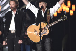 Ronnie Dunn, left, and Kix Brooks, of Brooks &amp; Dunn, accept the milestone award at the 50th annual Academy of Country Music Awards at AT&amp;T Stadium on Sunday, April 19, 2015, in Arlington, Texas. (Photo by Chris Pizzello/Invision/AP)