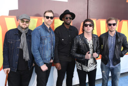 Mike Retondo, and from left, Tim Lopez, De'Mar Hamilton, Tom Higgenson, and Dave Tirio of the musical group Plain White T's arrive at the MTV Movie Awards at the Nokia Theatre on Sunday, April 12, 2015, in Los Angeles. (Photo by Matt Sayles/Invision/AP)