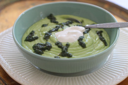 This Feb. 16, 2015 photo shows chilled cucumber, avocado and pea soup with mint pesto in Concord, N.H. (AP Photo/Matthew Mead)