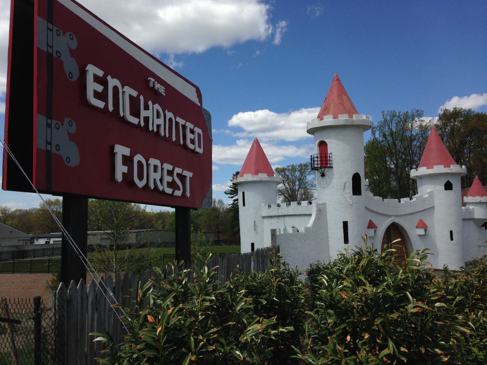 A storybook-shaped sign and the castle entrance to the theme park are still located at the shopping center, but both are set to be moved soon. (WTOP/Michelle Basch)