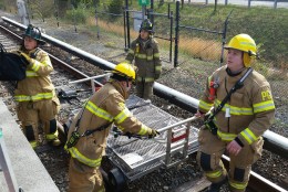 During Saturday's drill, firefighters practiced its emergency response at the Greenbelt Metro. (WTOP/Kathy Stewart)