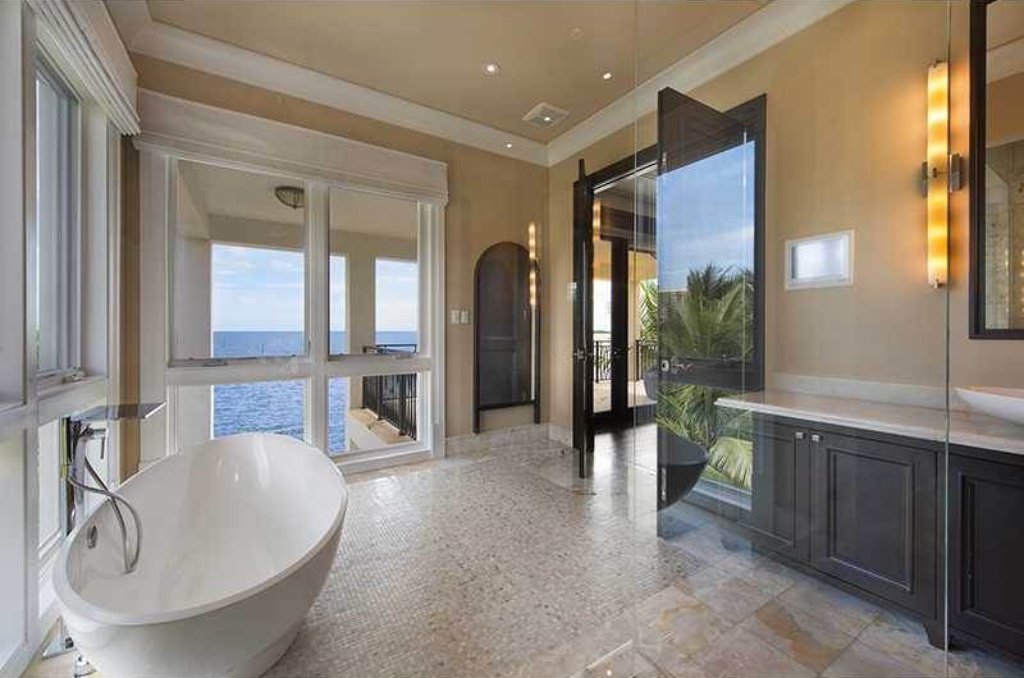 Seen here is one of the nine baths that make up the home's 12,178 square feet. LeBron James recently reduced the asking price for this South Florida mansion to $15 million. The mansion also features a theater, seen here, as well as a wine cellar, office and tall ceilings. (Courtesy Genelle Brown/TopTenRealEstate)