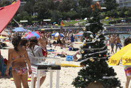 A Christmas tree stands on Bondi Beach in Sydney, Australia, Sunday, Dec. 25, 2011. (AP Photo/Rob Griffith)