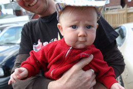 This May 7, 2011 photo shows David Stocker holding his 4-month-old child, Storm, in Toronto. Storm's parents, Kathy Witterick, 38, and Stocker, 39, of Toronto, have chosen to keep the gender of Storm a secret. They have shared Storms's gender only with their sons Jazz, 5, and Kio, 2, a close family friend and two midwives who helped deliver the baby.   (AP Photo/THE CANADIAN PRESS/Toronto Star, Steve Russell)