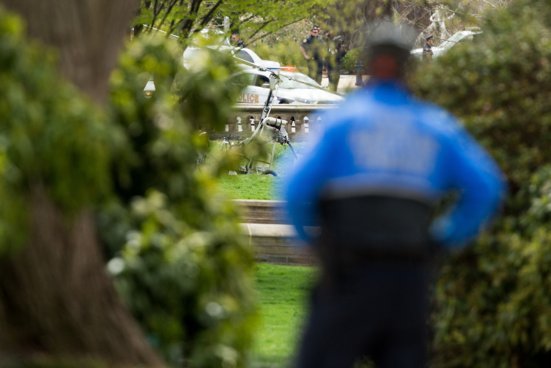 A small helicopter sits on the West Lawn of the Capitol in Washington, Wednesday, April 15, 2015. ?The U.S. Capitol Police is investigating a gyro copter with a single occupant that has landed on the grassy area of the West Lawn of t?he U.S. Capitol. The U.S. Capitol Police continues to investigate with one person detained and temporary street closures in the immediate area.  (AP Photo/Andrew Harnik)