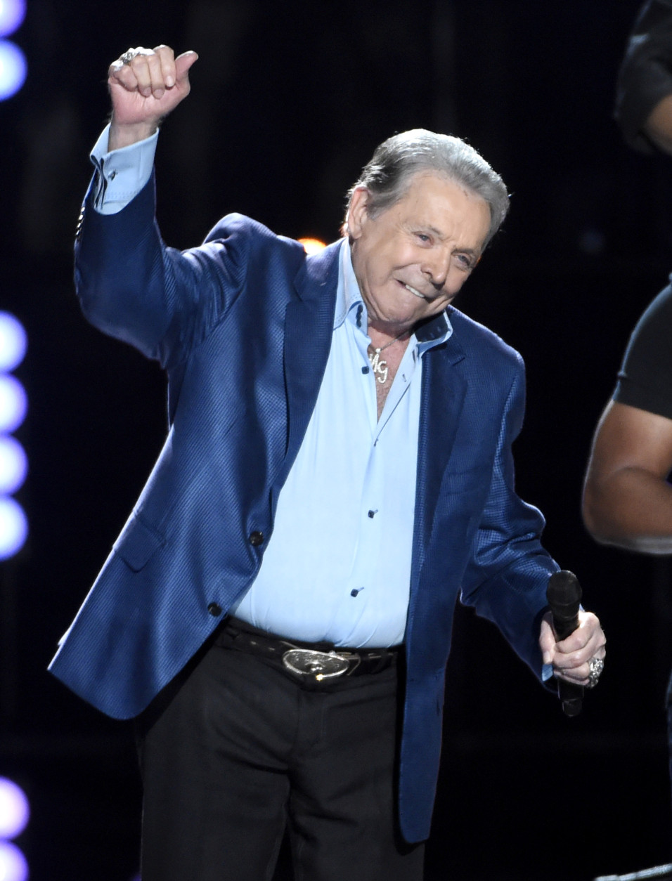 Mickey Gilley accepts the triple crown award at ACM Presents Superstar Duets at Globe Life Park on Friday, April 17, 2015, in Arlington, Texas. (Photo by Chris Pizzello/Invision/AP)