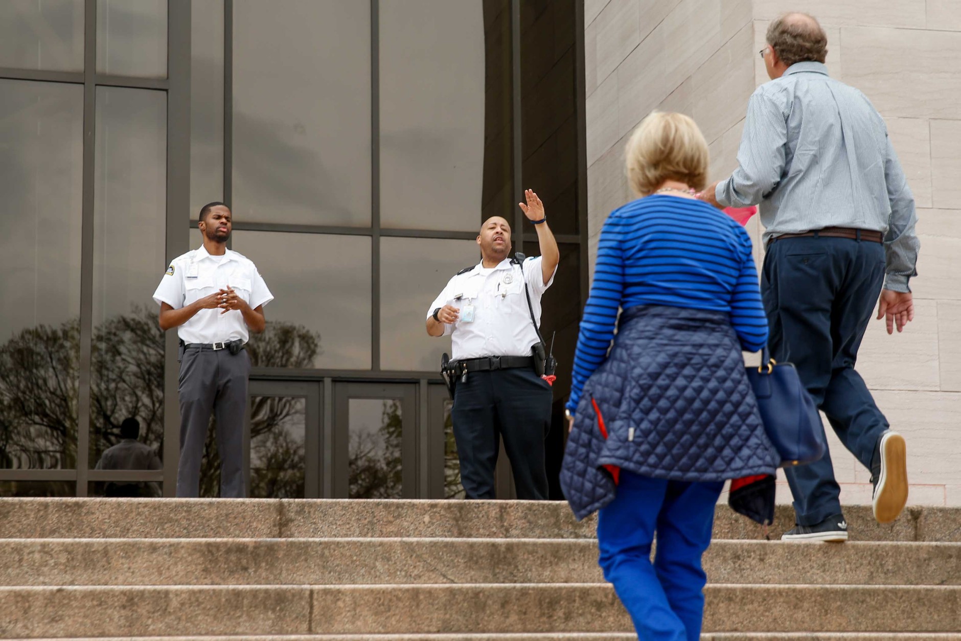 Security guards turn visitors away from the Smithsonian's National Air and Space Museum in Washington, Tuesday, April 7, 2015, after widespread power outages cause many of the buildings along the National Mall to shut down temporarily. Widespread power outages affected the White House, State Department, Capitol and other sites across Washington and its suburbs Tuesday afternoon — all because of an explosion at a power plant in southern Maryland, an official said.  (AP Photo/Andrew Harnik)