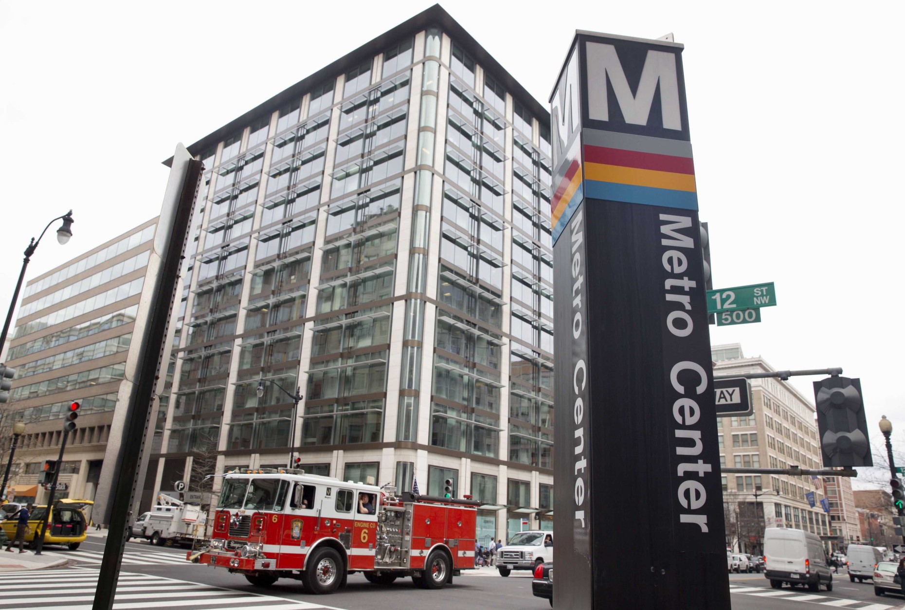 A firetruck passes the Metro Center metro stop in downtown Washington, Tuesday, April 7, 2015, as power begins to return to the area after a brief outage. Widespread power outages affected the White House, State Department, Capitol and other sites across Washington and its suburbs Tuesday afternoon — all because of an explosion at a power plant in southern Maryland, an official said. (AP Photo/Jacquelyn Martin)