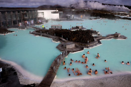 REYKJAVIK, ICELAND - APRIL 07:  Visitors sit in the geothermal waters at the Blue Lagoon close to the Icelandic capital of Reykjavik on April 7, 2014 in Reykjavik, Iceland. Since the financial meltdown of 2008 which saw the Icelandic economy come close to collapse the island has been slowly recovering and unemployment levels are beginning to return to normal.  (Photo by Matt Cardy/Getty Images)