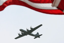 WASHINGTON, DC - MAY 08: A vintage World War II B29 bomber flies down the National Mall May 8, 2015 in Washington, DC. Fifty-six vintage war planes took part in a flyover near the WWII memorial for the 70th anniversary Victory in Europe celebration.  (Photo by Mark Wilson/Getty Images)