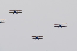 WASHINGTON, DC - MAY 08:  Vintage World War II  war planes fly in formation down the National Mall May 8, 2015 in Washington, DC. Fifty six vintage war planes took part in a flyover near the WWII memorial for the 70th anniversary Victory in Europe celebration.  (Photo by Mark Wilson/Getty Images)
