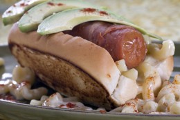 A maxed mac and cheese hotdog is seen in this May 2, 2010 photo. With a prosciutto wrap on the dog this recipe is a summer favorite in the extreme. (AP Photo/Larry Crowe)