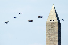 World War II vintage aircrafts flyover near the Washington Monument over Washington, Friday, May 8, 2015, marking the 70th anniversary of the end of the war in Europe on May 8, 1945, and commemorate the Allied victory in Europe during World War II. (AP Photo/Manuel Balce Ceneta)