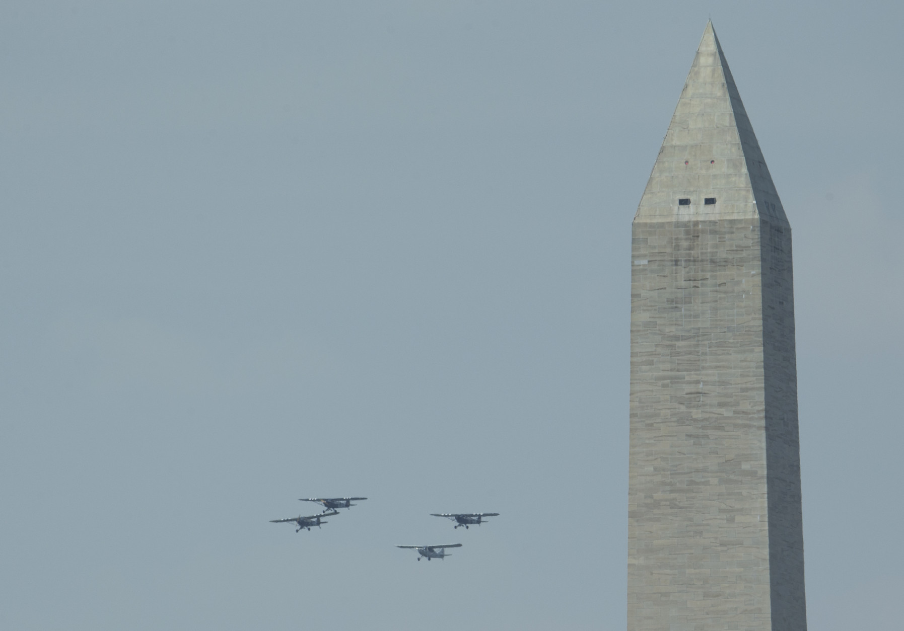World War II vintage aircrafts during a flyover over Washington, Friday, May 8, 2015, marking the 70th anniversary of the end of the war in Europe on May 8, 1945, and commemorate the Allied victory in Europe during World War II. (AP Photo/Manuel Balce Ceneta)