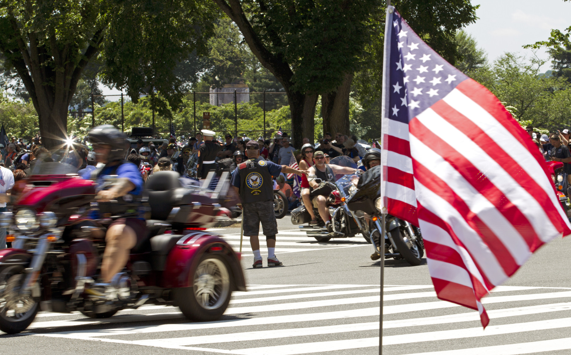 Participants in the Rolling Thunder annual motorcycle rally ride in the national mall during the annual Rolling Thunder parade ahead of Memorial Day in Washington, Sunday, May 24, 2015.  (AP Photo/Jose Luis Magana)