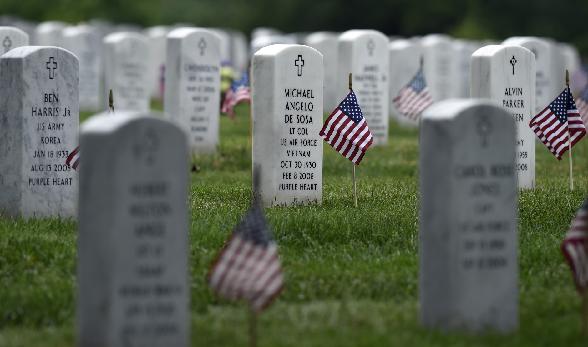 Every headstone at Arlington National Cemetery in Arlington, Va., has a flag placed in front of it, Thursday, May 21, 2015. Flags-In is a time honored tradition that is reserved for Soldiers of the 3rd U.S. Infantry Regiment (The Old Guard).  Since The Old Guards designation as the Armys official ceremonial unit in 1948, they have conducted this mission annually at Arlington National Cemetery prior to Memorial Day to honor our nations fallen military heroes. (AP Photo/Susan Walsh)