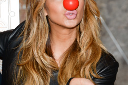 Singer Nicole Scherzinger attends the Empire State Building lighting in honor of NBC's Red Nose Day entertainment charity event on Thursday, May 21, 2015, in New York. (Photo by Evan Agostini/Invision/AP)