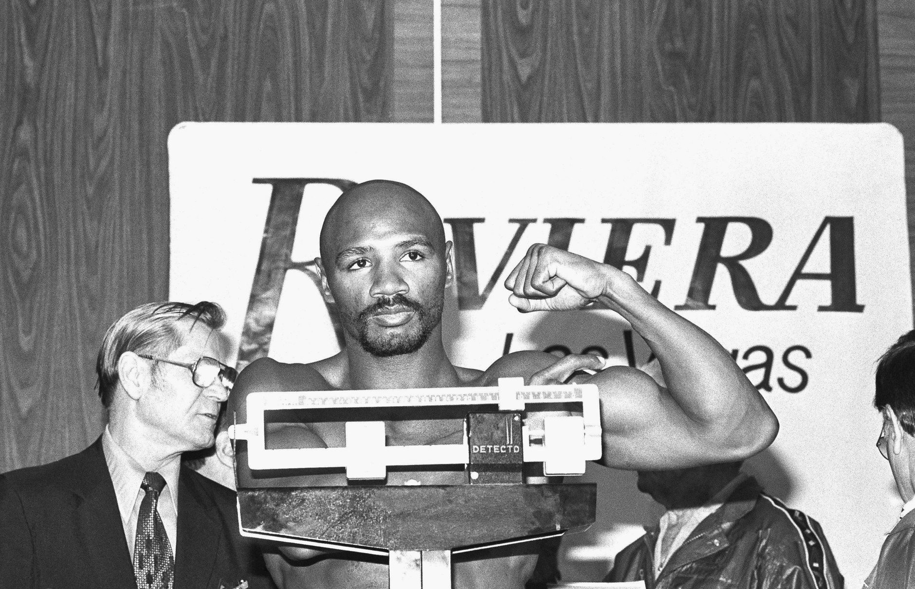 Undisputed middleweight champion Marvelous Marvin Hagler shows off his muscle during weigh-in on March 30, 1984 in Las Vegas for his championship fight with WBA number one contender Juan Roldan of Argentina at Riviera Hotel Friday night. Hagler and Roldan both weighed 159 ? pounds. (AP Photo/ Lennox McLendon)