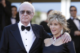 Actors Michael Caine, left, and Jane Fonda pose for photographers as they arrive for the screening of the film Youth at the 68th international film festival, Cannes, southern France, Wednesday, May 20, 2015. (AP Photo/Lionel Cironneau)