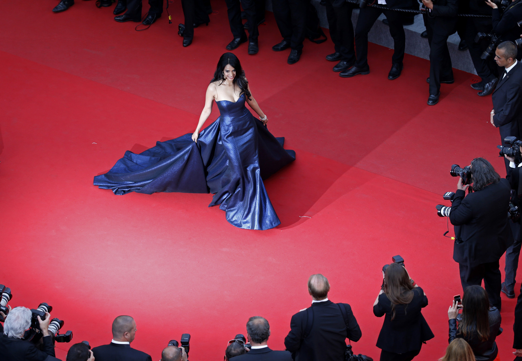 Actress Mallika Sherawat poses for the screening of the film Macbeth at the 68th international film festival, Cannes, southern France, Saturday, May 23, 2015. (Eric Gaillard/Pool via AP)