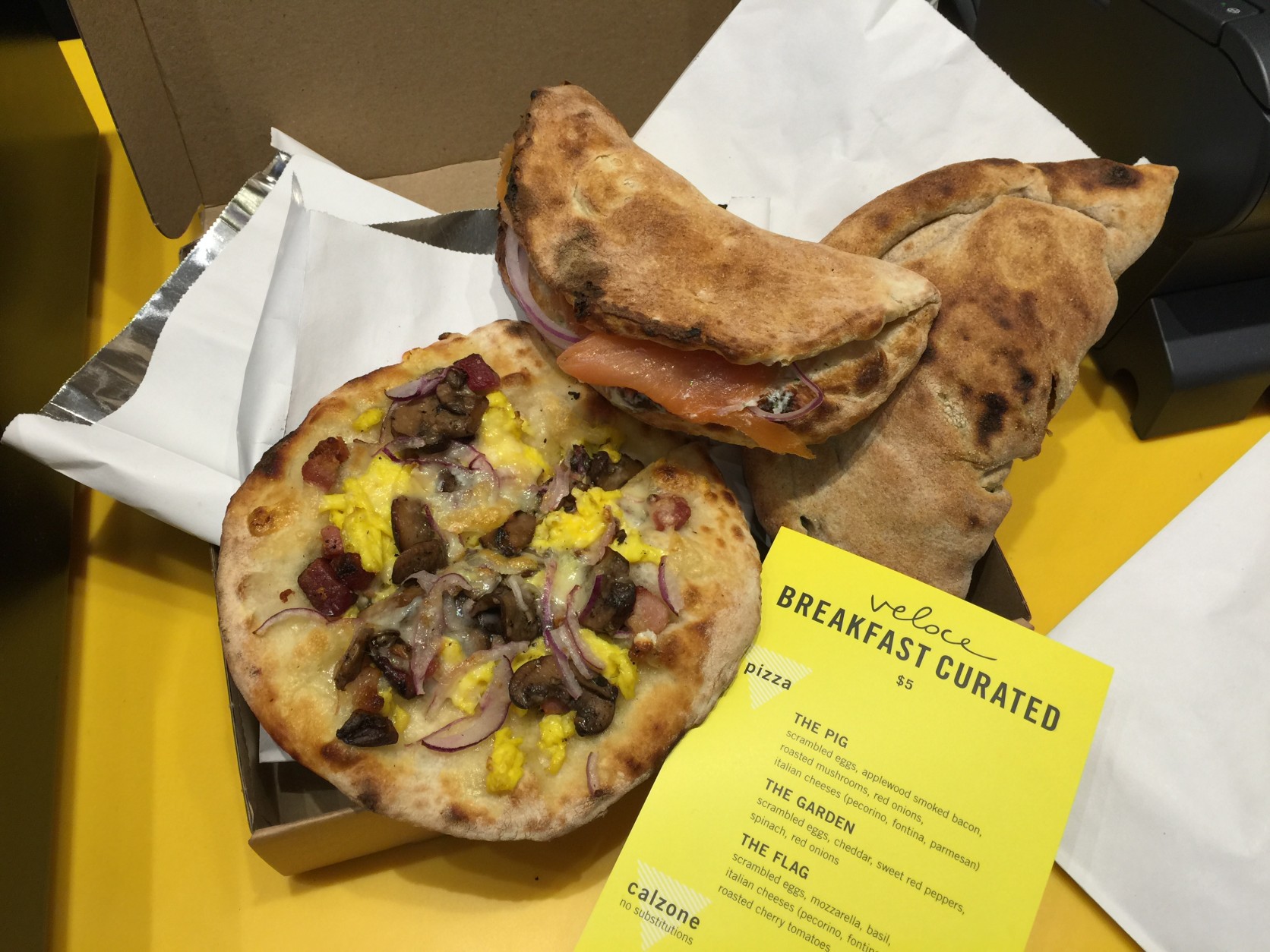 Some of the breakfast pizzas at Veloce. (WTOP/Kristi King)